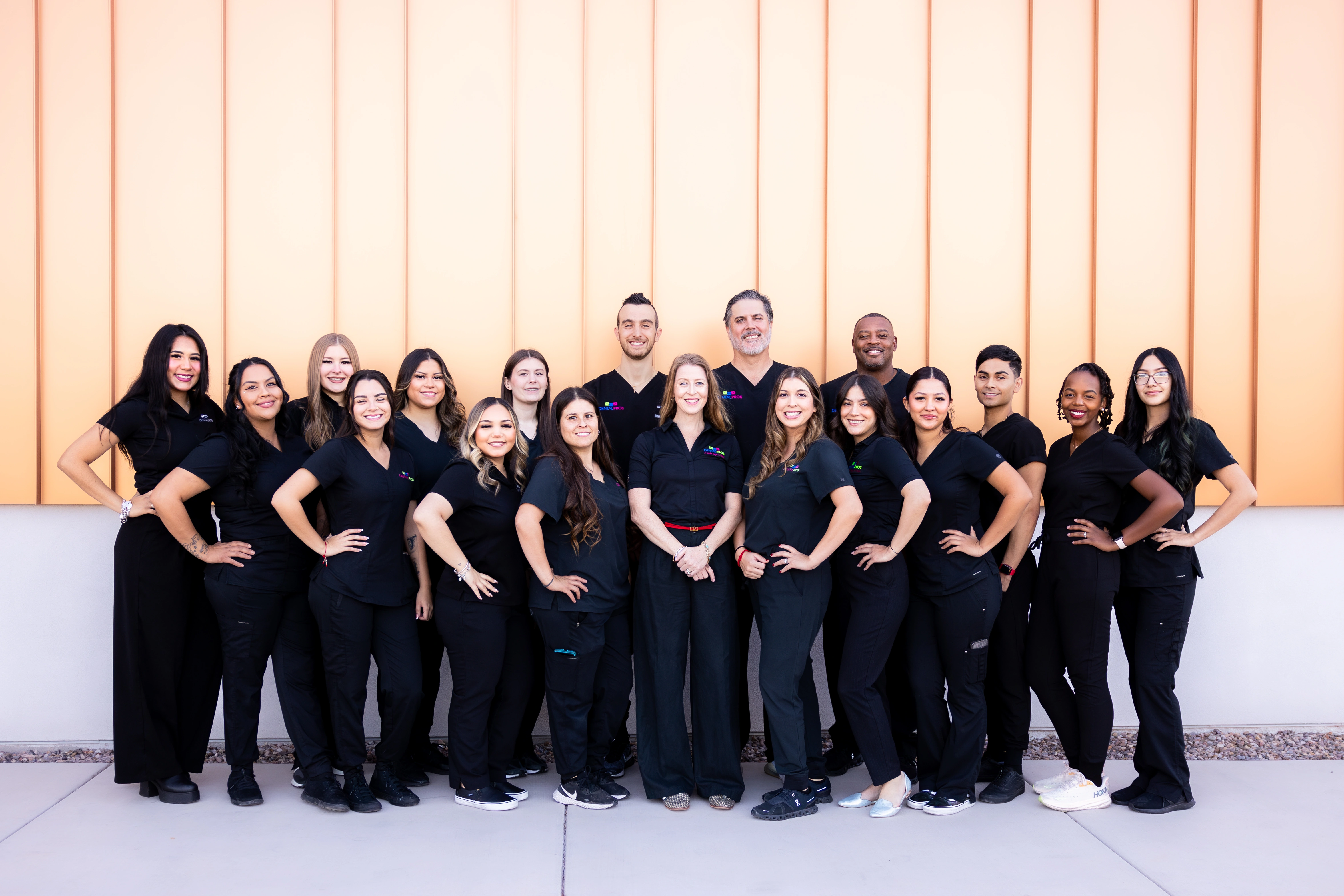 The DentalPros team gathered outside a DentalPros office