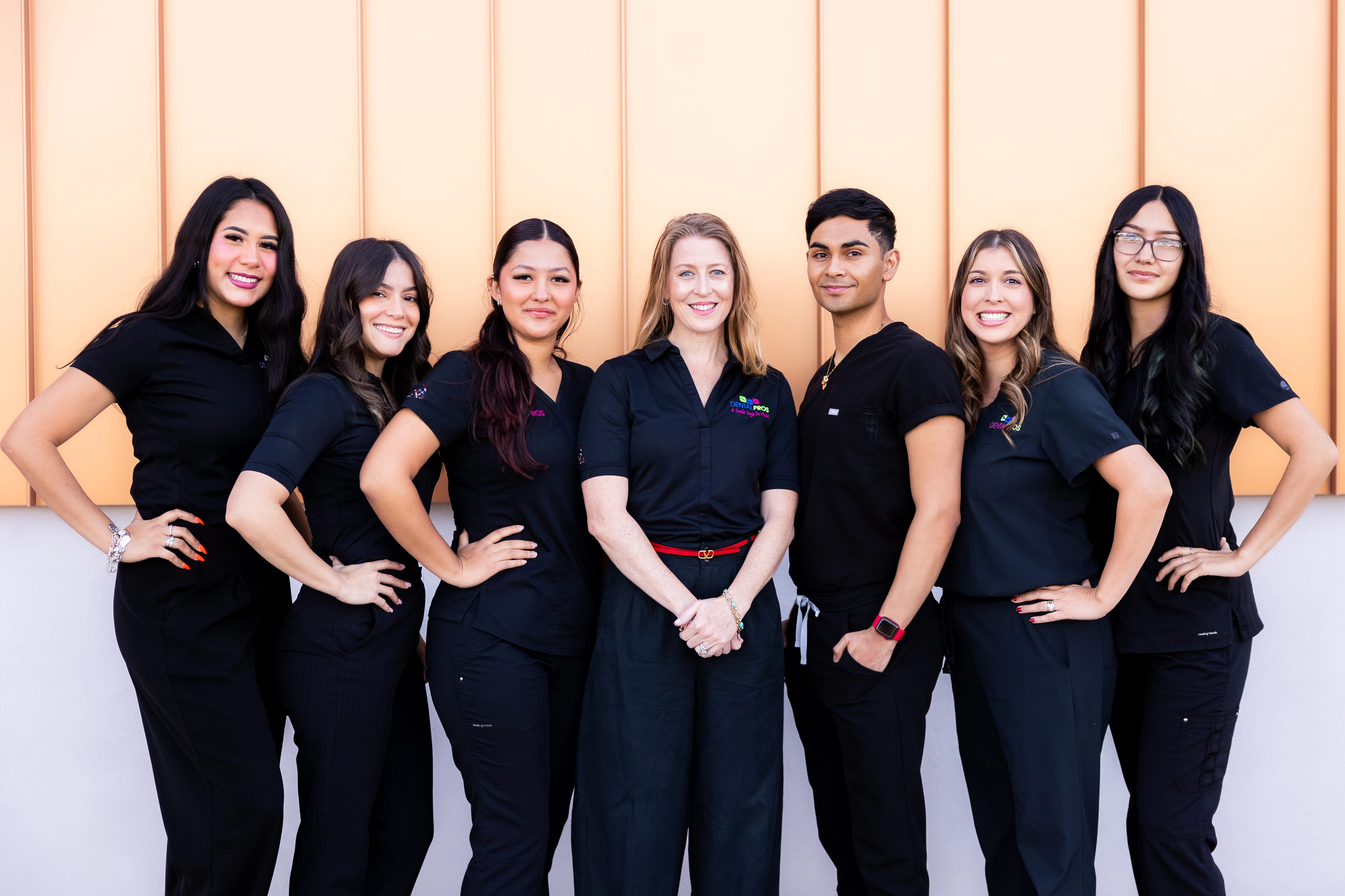 The DentalPros North Tucson team standing together outside the office