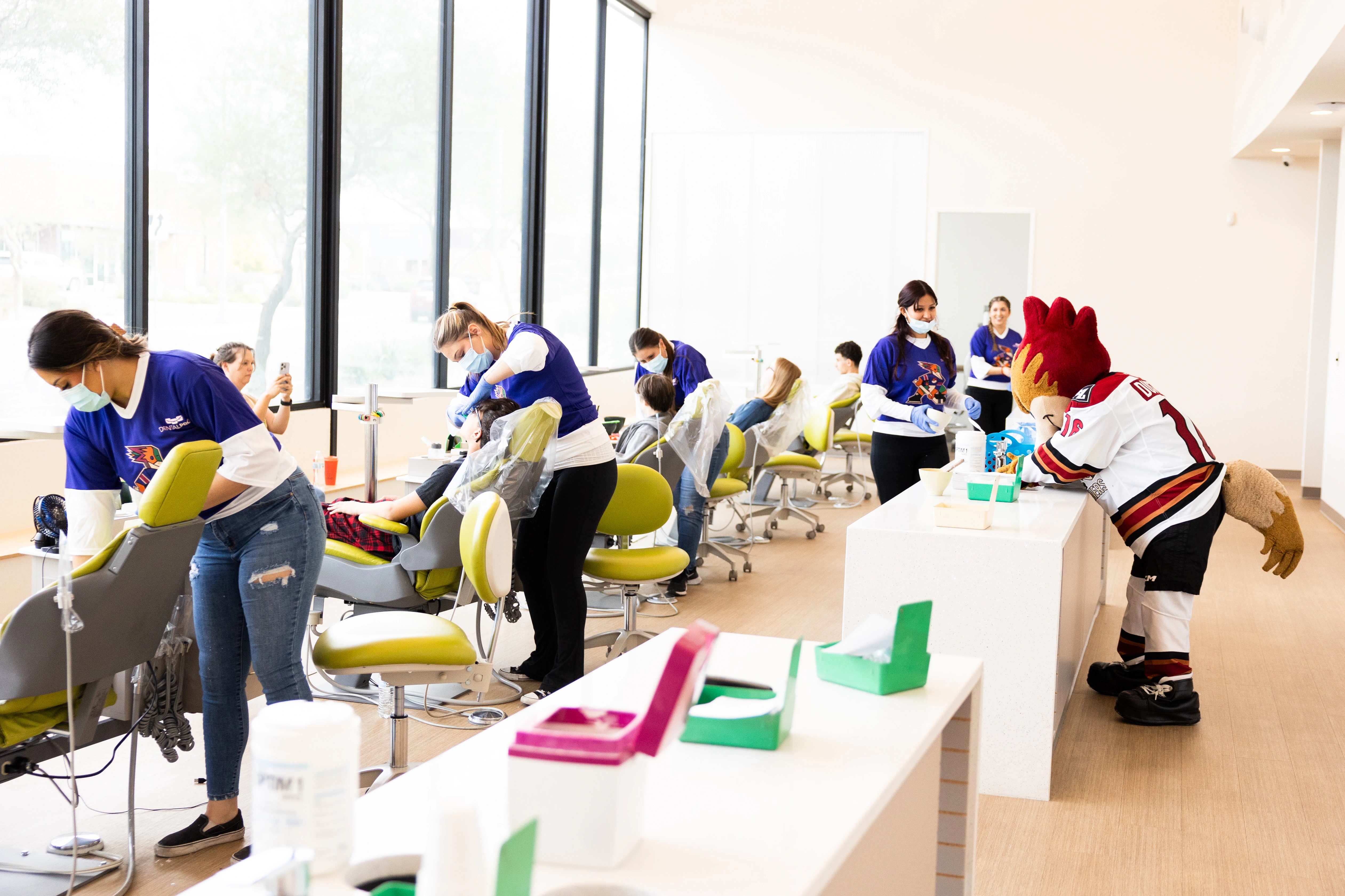DentalPros team members caring for patients in the office