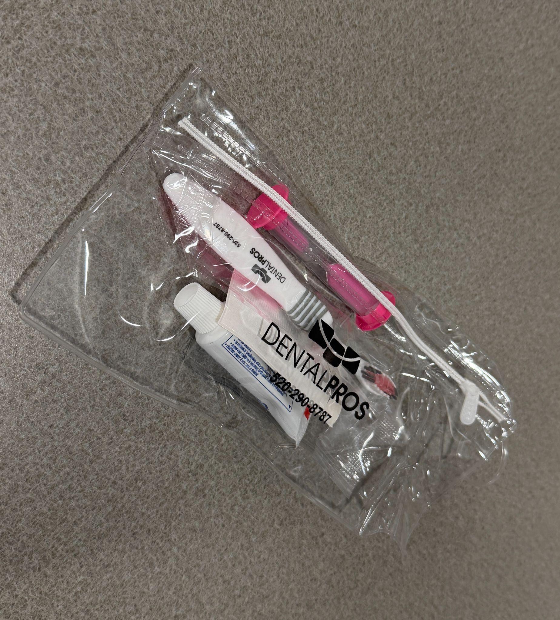 Orthodontic care kit with a travel toothbrush, toothpaste, floss, and wax