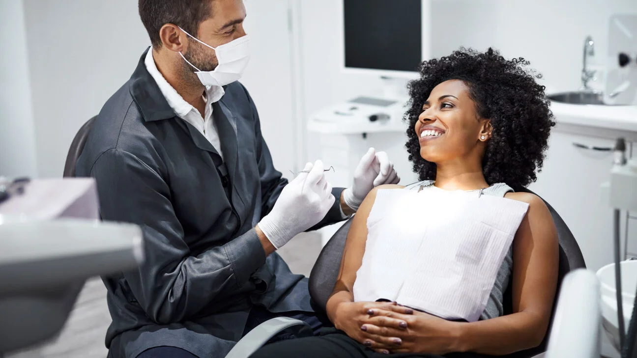 A patient meeting with a dentist for treatment planning