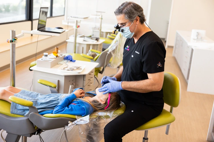 A child receiving friendly dental care